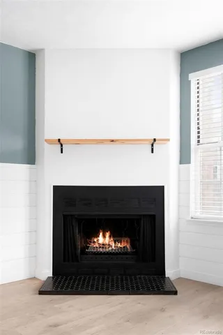 a living room with a fireplace