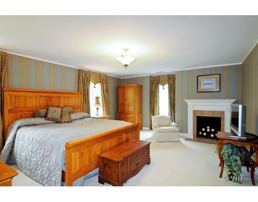 120 Fairbank Road Riverside, IL 60546 - Photo 10 of 16 a bed room with a bed and a fireplace