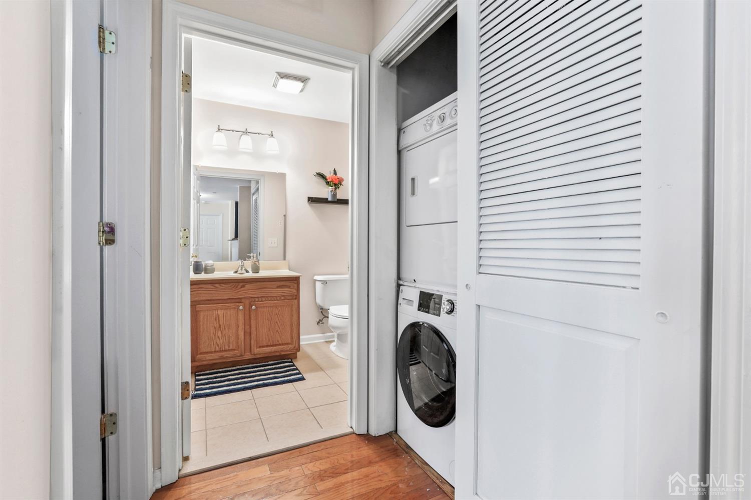 358 Rector Street, Unit 706 Perth Amboy, NJ 08861 - Photo 14 of 20 a view of a bedroom with washer and dryer