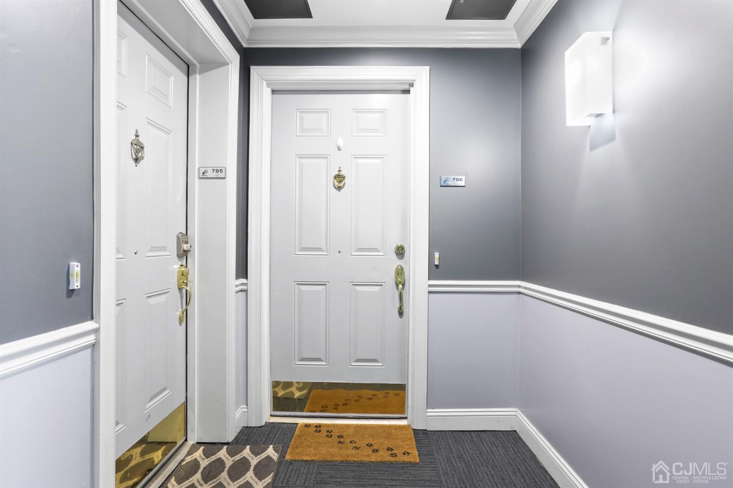 358 Rector Street, Unit 706 Perth Amboy, NJ 08861 - Photo 3 of 20 a view of room with walk in closet and wooden floor