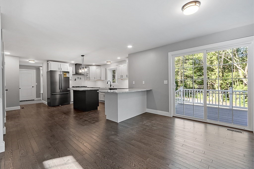 131 French Road, Unit LOT 10 Templeton, MA 01468 - Photo 12 of 35 a view of kitchen with wooden floor and window