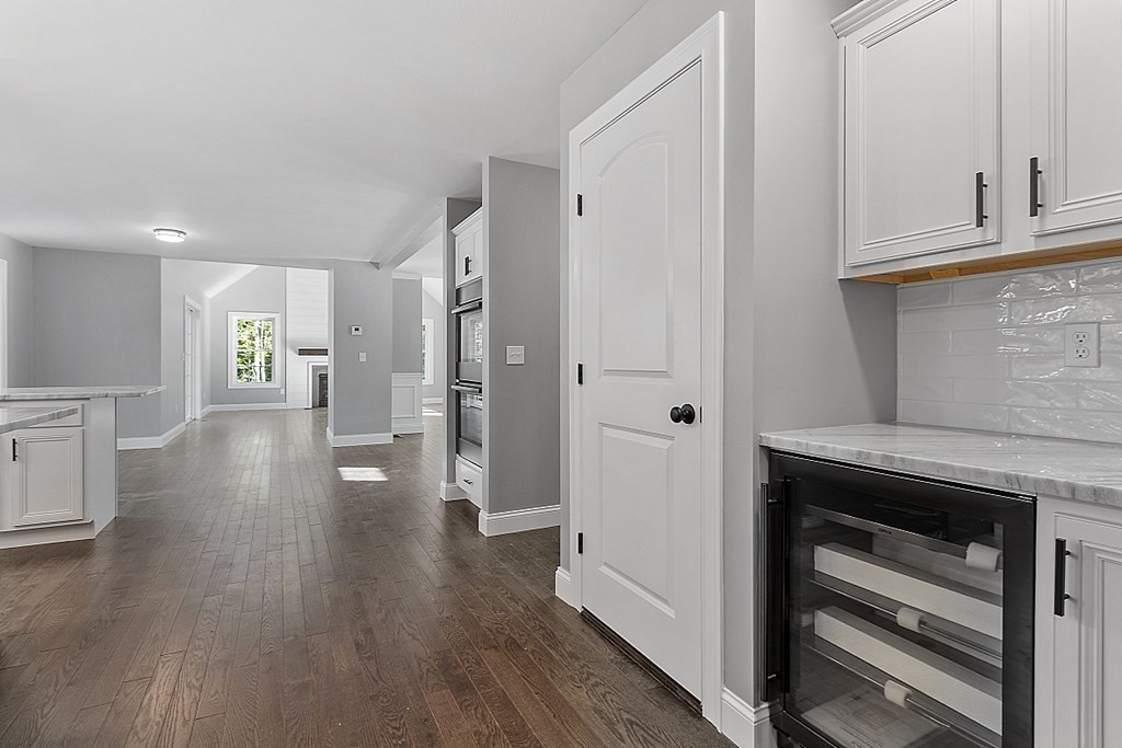 131 French Road, Unit LOT 10 Templeton, MA 01468 - Photo 17 of 35 a view of a kitchen with wooden floor and cabinets