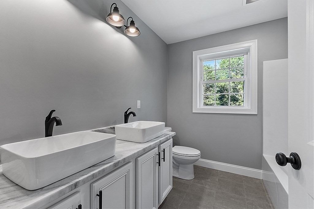 131 French Road, Unit LOT 10 Templeton, MA 01468 - Photo 28 of 35 a bathroom with a sink toilet and a mirror