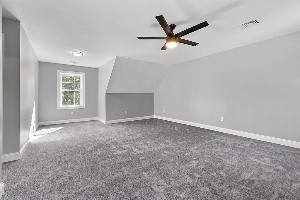 131 French Road, Unit LOT 10 Templeton, MA 01468 - Photo 29 of 35 a view of a livingroom with a ceiling fan and window