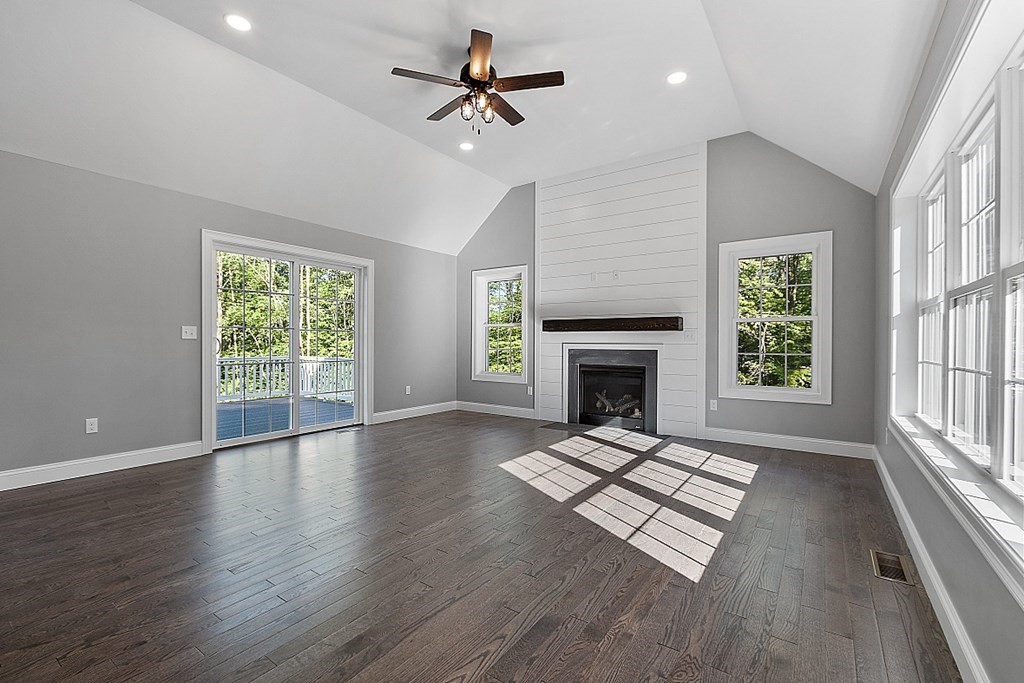 131 French Road, Unit LOT 10 Templeton, MA 01468 - Photo 10 of 35 an empty room with windows and fireplace