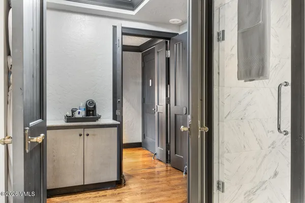 a view of a bathroom from the hallway