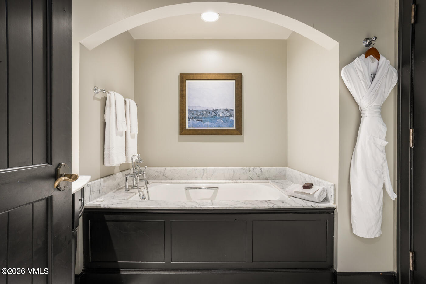 130 Daybreak Ridge Road, Unit HS725 Avon, CO 81620 - Photo 17 of 38 a bathroom with a sink and mirror
