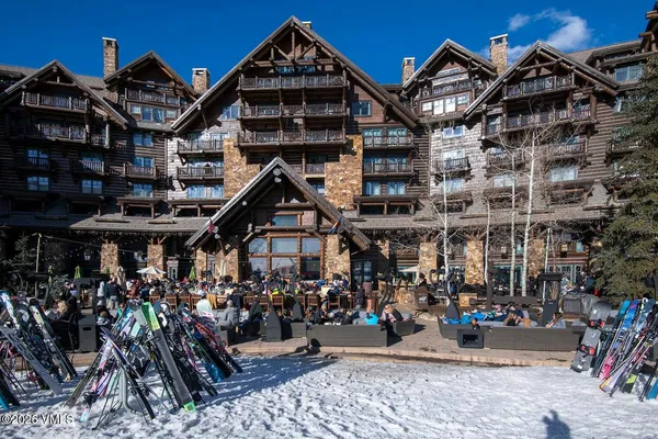 a view of a building with sitting area