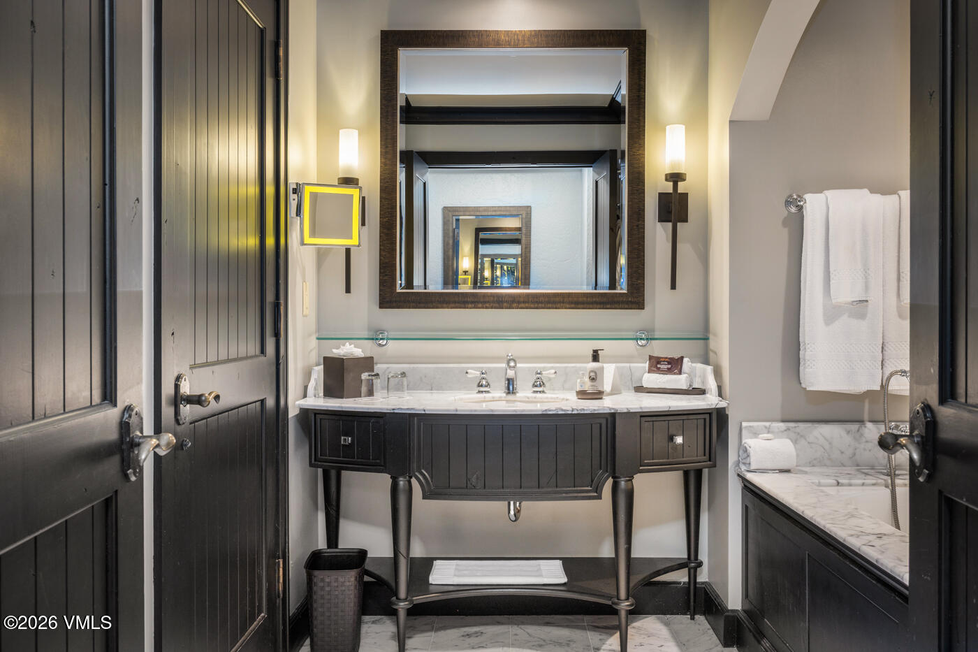130 Daybreak Ridge Road, Unit HS725 Avon, CO 81620 - Photo 29 of 38 a bathroom with a sink and a mirror