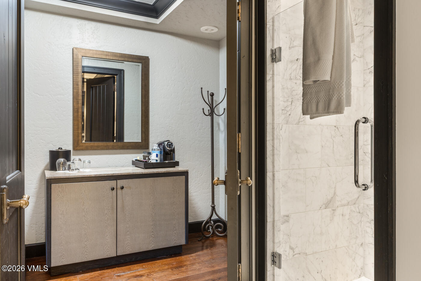 130 Daybreak Ridge Road, Unit HS725 Avon, CO 81620 - Photo 30 of 38 a bathroom with a sink and a mirror