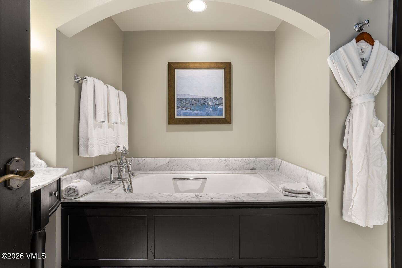 130 Daybreak Ridge Road, Unit HS725 Avon, CO 81620 - Photo 31 of 38 a bathroom with a sink and a mirror