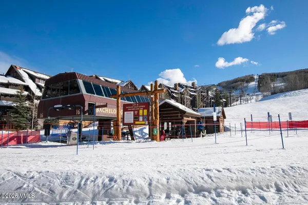 a view of a house with a snow on the road