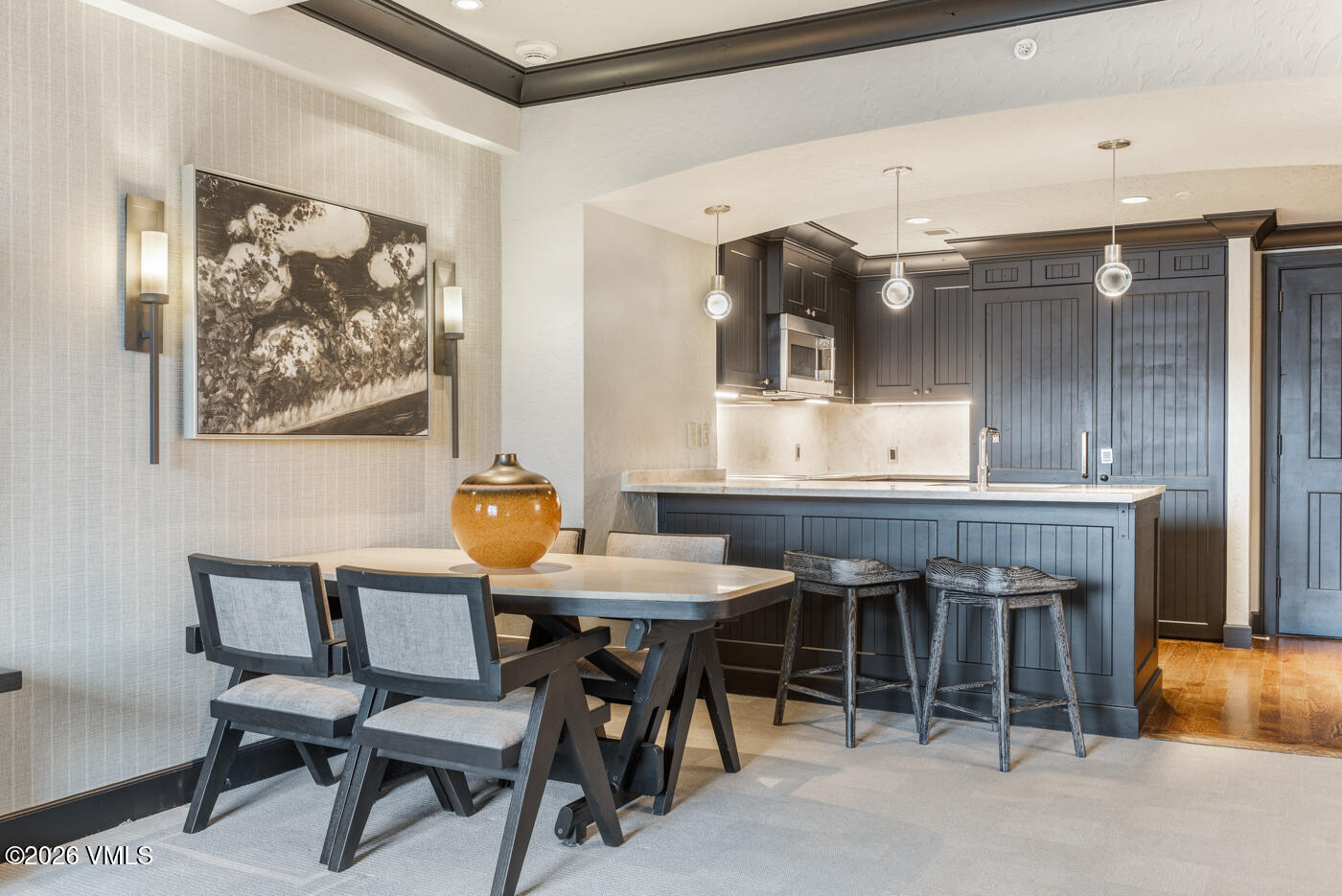 130 Daybreak Ridge Road, Unit HS725 Avon, CO 81620 - Photo 5 of 38 a dining room with a table and chairs