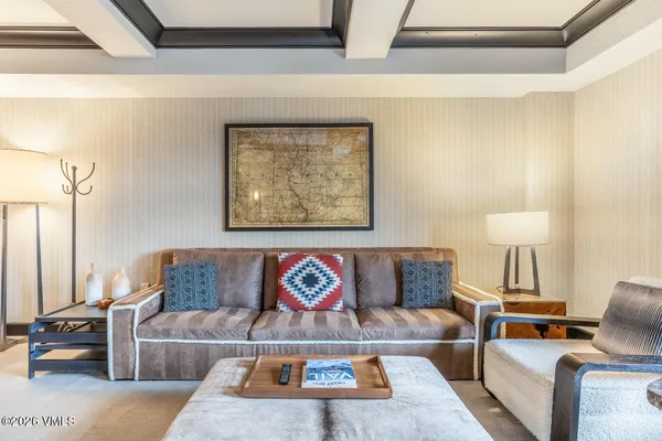 a living room with furniture and a couch