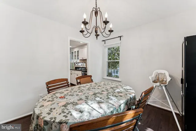 a bedroom with bed and window