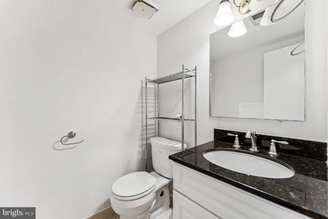 a view of balcony with wooden floor and outdoor seating