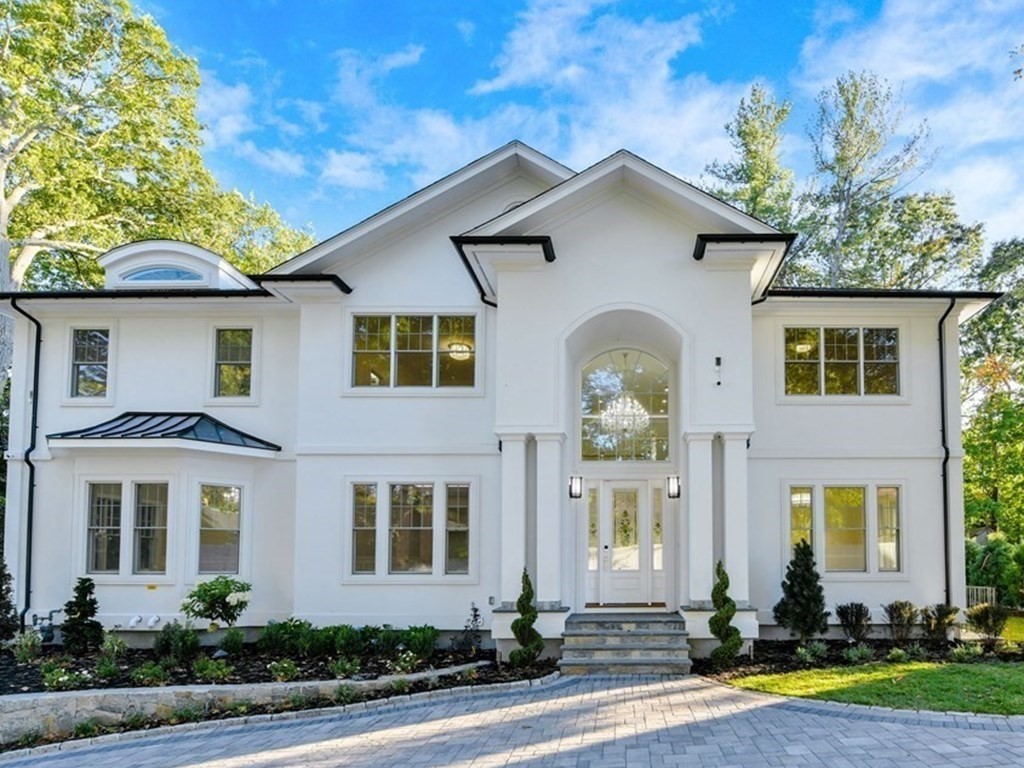 70 Helene Road Newton, MA 02468 - Photo 2 of 35 a front view of a house with garden