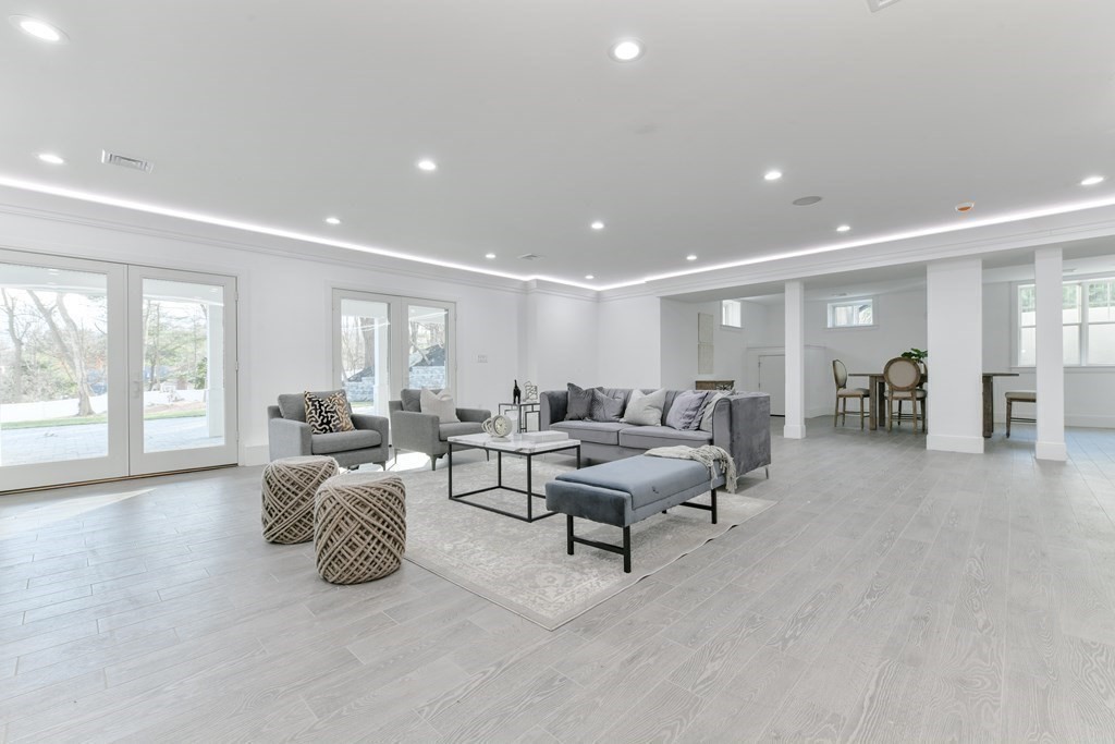 70 Helene Road Newton, MA 02468 - Photo 25 of 35 a living room with furniture and a large window