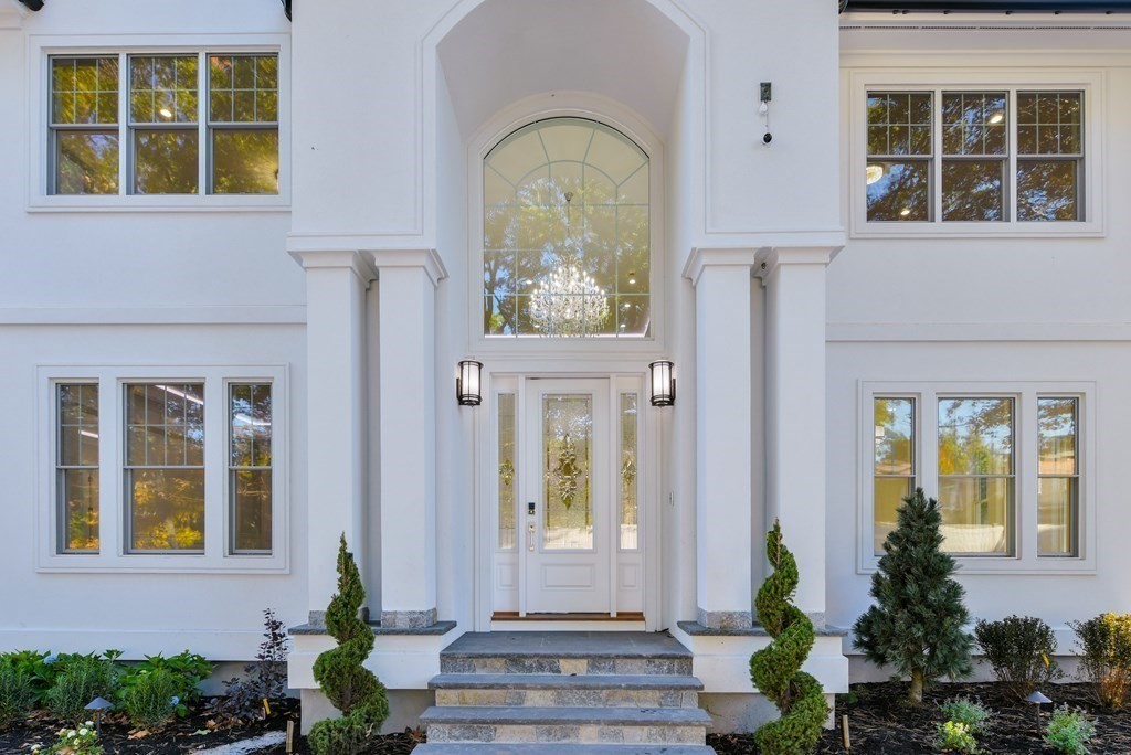 70 Helene Road Newton, MA 02468 - Photo 3 of 35 a front view of a house having yard