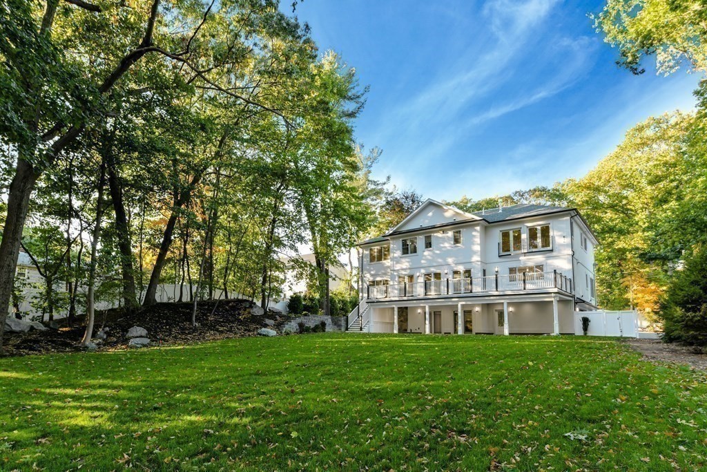 70 Helene Road Newton, MA 02468 - Photo 33 of 35 a front view of a house with a garden
