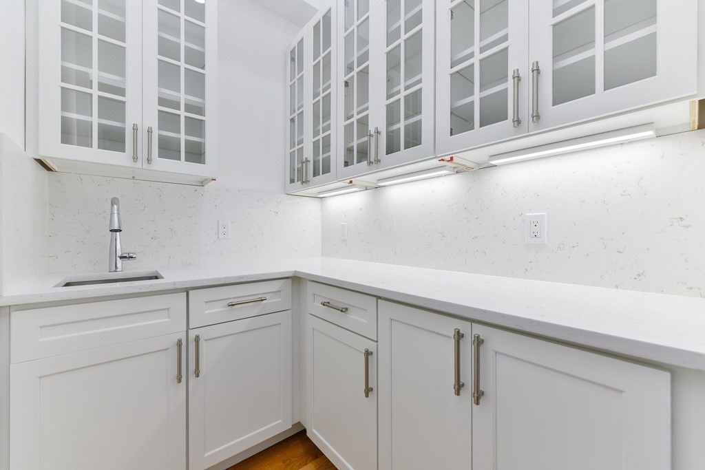 70 Helene Road Newton, MA 02468 - Photo 9 of 35 a view of cabinets and window