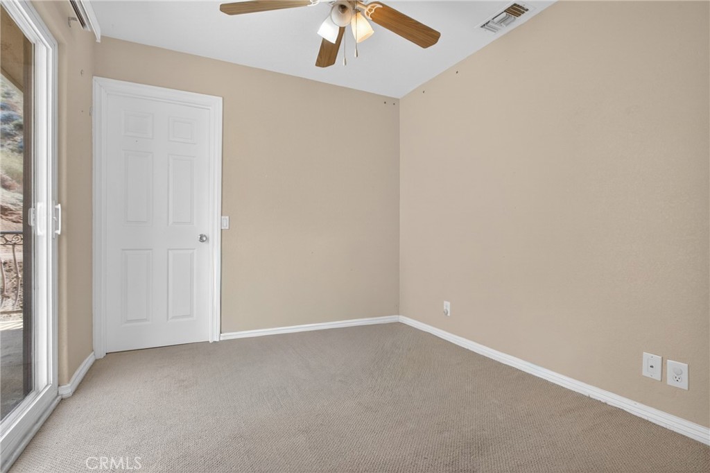 29631 Silver Street Castaic, CA 91384 - Photo 25 of 36 Guest bedroom with Sliding Glass door to balcony