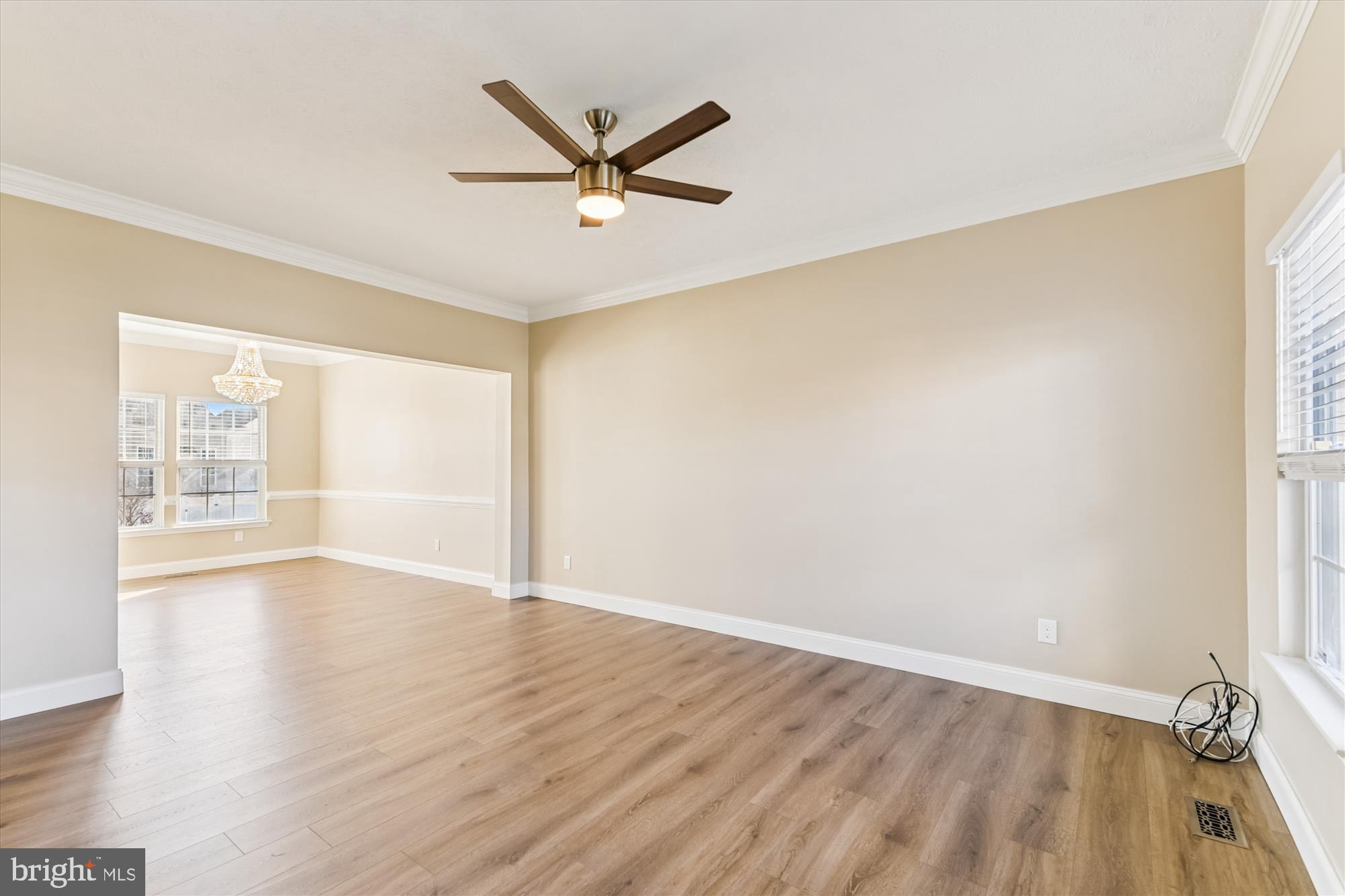 1375 Tralee Circle Aberdeen, MD 21001 - Photo 14 of 41 wooden floor in an empty room with a window