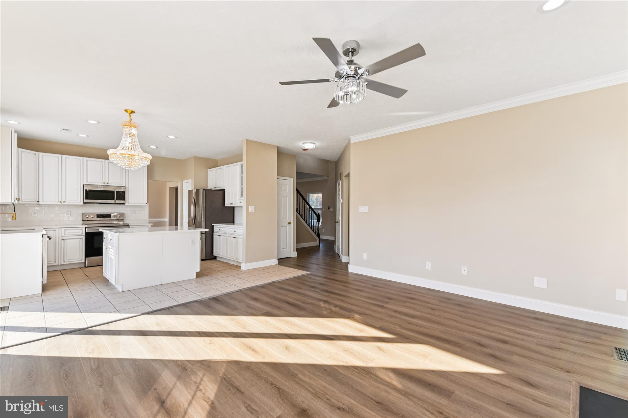 1375 Tralee Circle Aberdeen, MD 21001 - Photo 17 of 41 a view of a living room and kitchen with furniture appliances