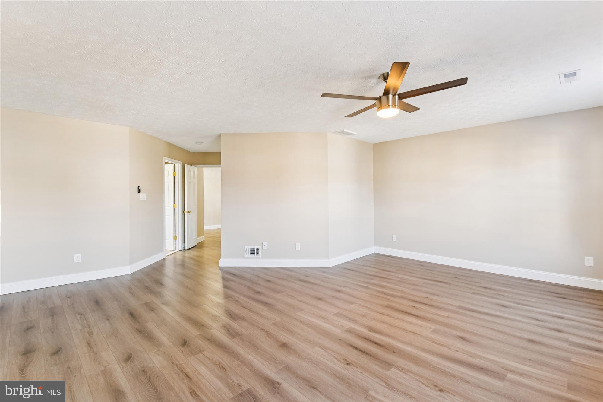 1375 Tralee Circle Aberdeen, MD 21001 - Photo 22 of 41 wooden floor in an empty room with a window