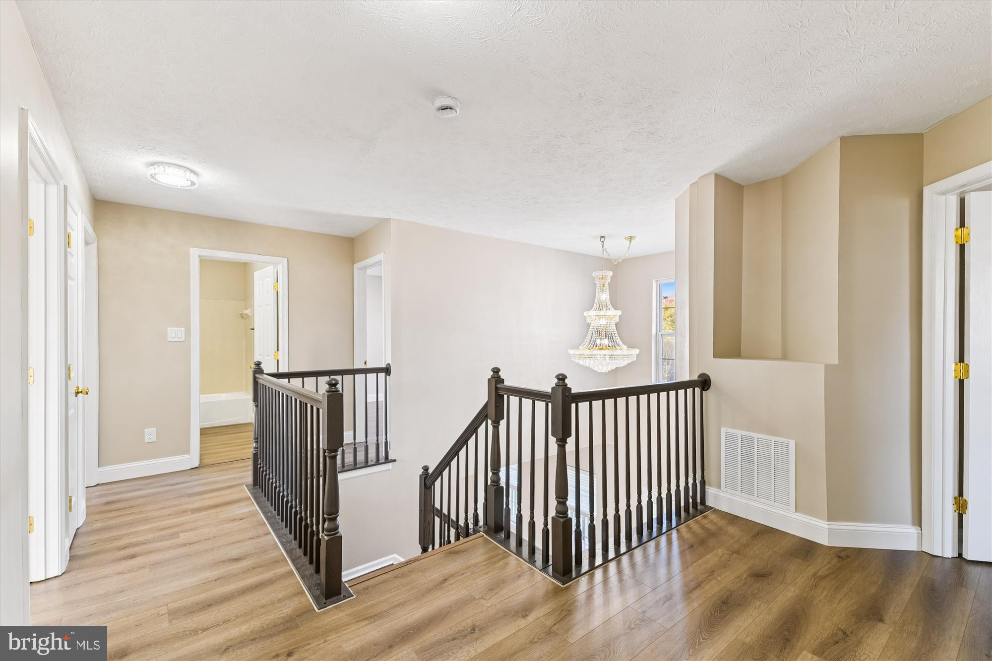 1375 Tralee Circle Aberdeen, MD 21001 - Photo 24 of 41 a view of a hallway with wooden floor and windows