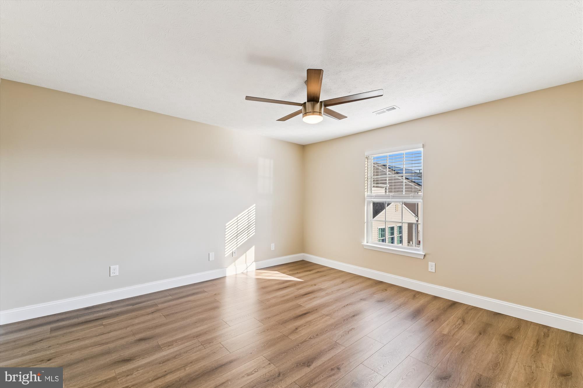 1375 Tralee Circle Aberdeen, MD 21001 - Photo 26 of 41 a view of wooden floor and a chandelier fan in a room