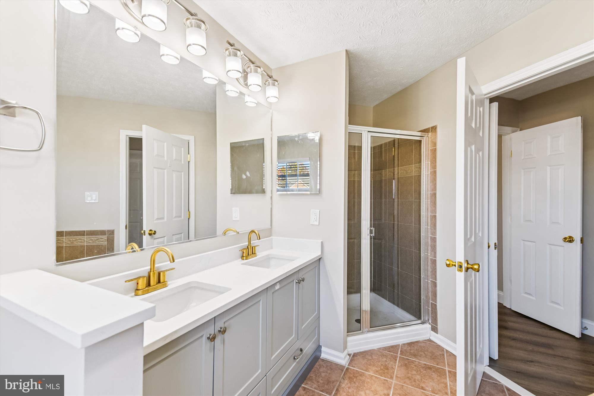 1375 Tralee Circle Aberdeen, MD 21001 - Photo 3 of 41 a bathroom with a sink double vanity and a mirror