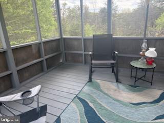 342 Big Maple Lane Schellsburg, PA 15559 - Photo 11 of 27 a living room with couch and a table