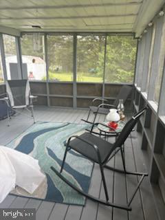342 Big Maple Lane Schellsburg, PA 15559 - Photo 12 of 27 a room with gym equipment and a large window