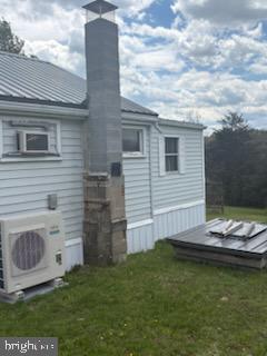 342 Big Maple Lane Schellsburg, PA 15559 - Photo 5 of 27 a view of a house with a yard