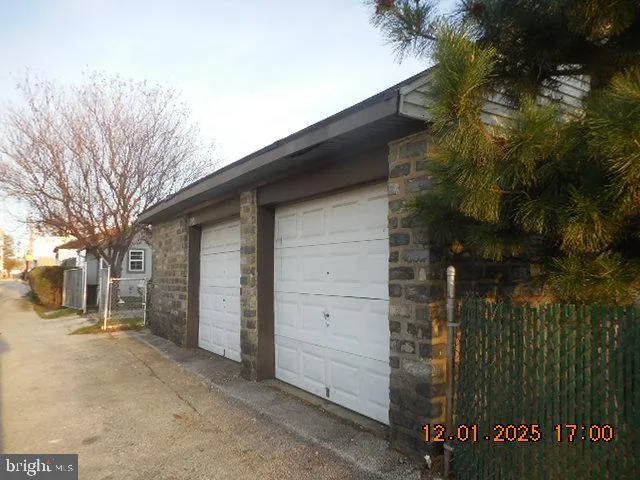 a view of a house with a tree