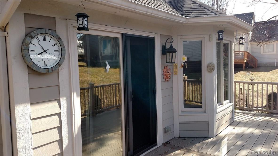 3124 Fairgrove Terrace, Unit 67 Rochester, MI 48309 - Photo 9 of 46 Rear entrance onto Deck