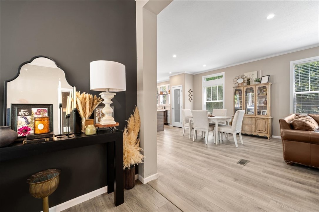 116 Parkview Road Iva, SC 29655 - Photo 5 of 44 An inviting open-concept living space boasts light wood flooring throughout the main areas.