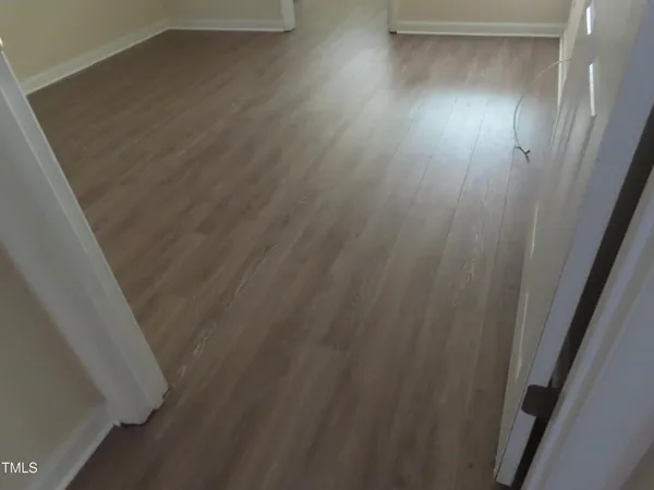 an empty room with a door