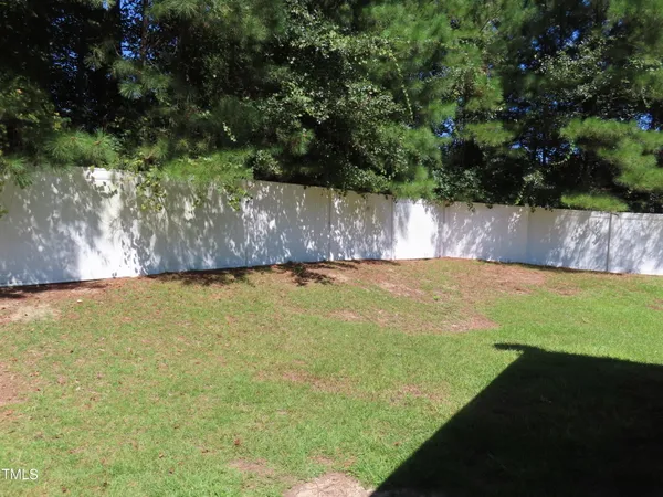 a view of a yard with an outdoor space