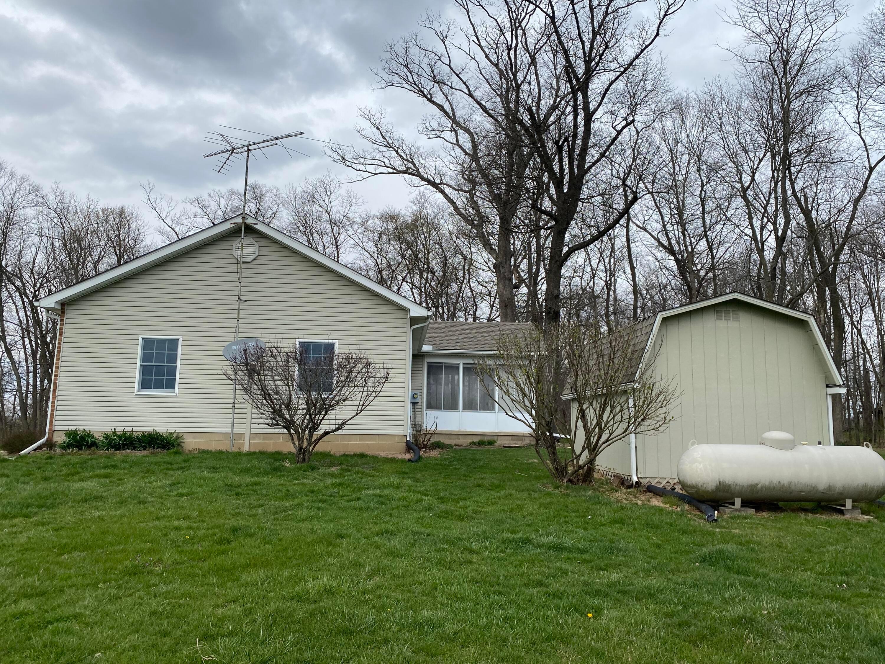 1675 Northridge Road Circleville, OH 43113 - Photo 10 of 49 Side with Shed and Owned Propane Tank