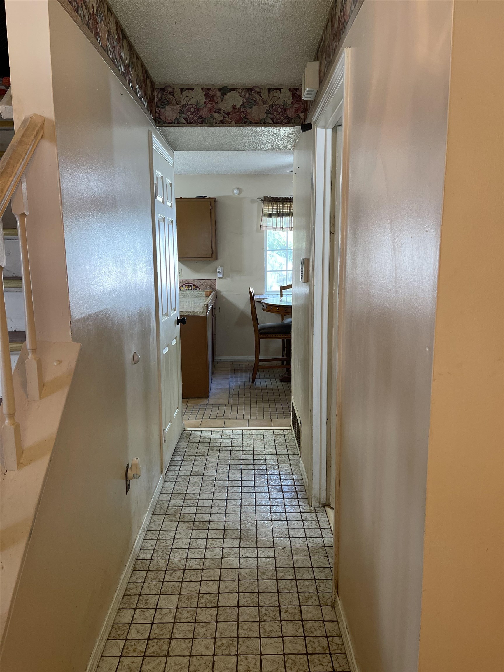 7380 Isherwood Road Memphis, TN 38125 - Photo 29 of 34 Leads to kitchen and den area. Laundry room sits in hallway on right side.