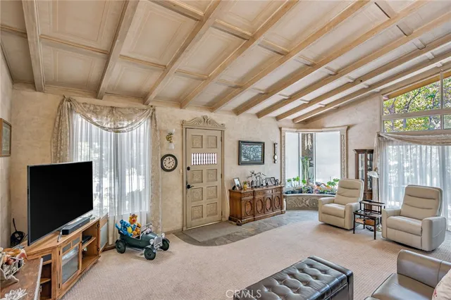 a kitchen with stainless steel appliances kitchen island granite countertop a sink and cabinets