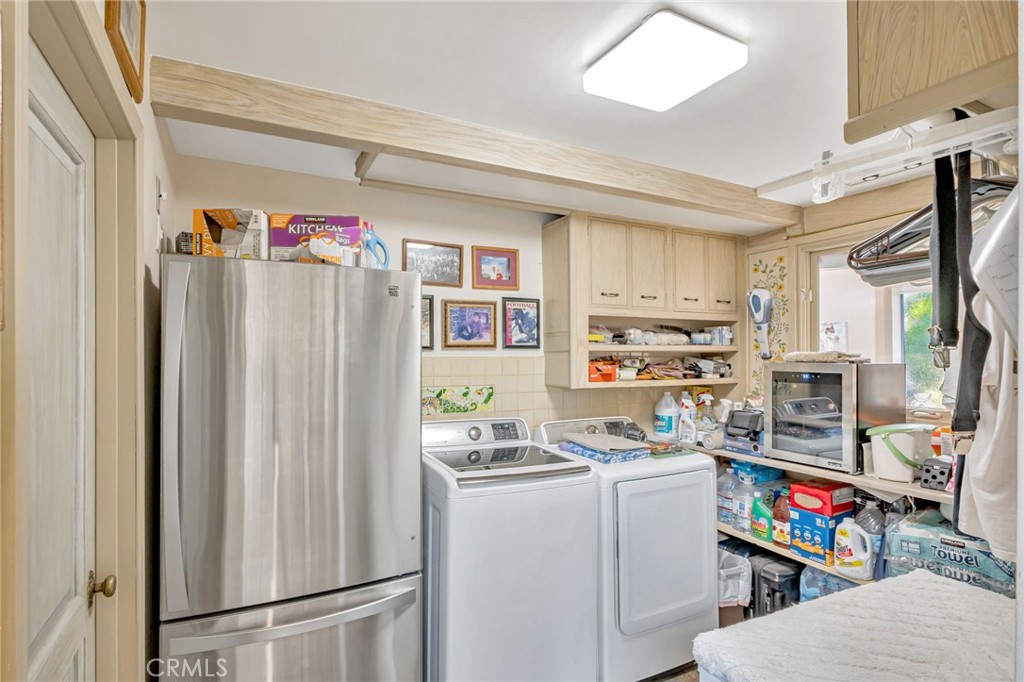 1126 Katherine Road Simi Valley, CA 93063 - Photo 16 of 66 a room with furniture a refrigerator and a window