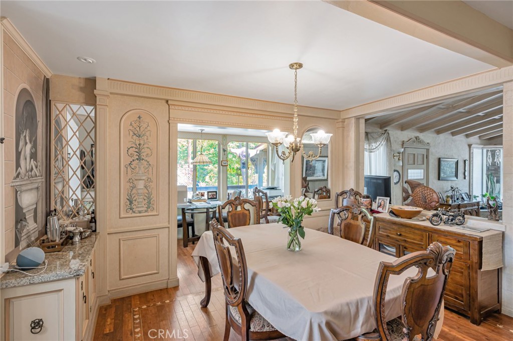 1126 Katherine Road Simi Valley, CA 93063 - Photo 18 of 66 a view of a dining room with furniture window and wooden floor