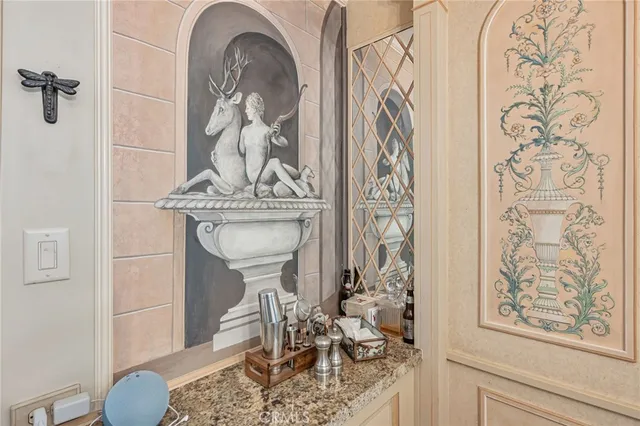 a bathroom with a toilet and a shower curtain