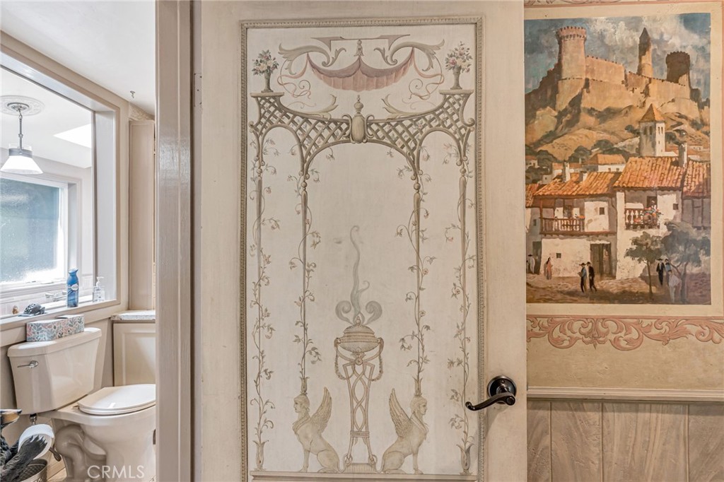 1126 Katherine Road Simi Valley, CA 93063 - Photo 29 of 66 a bathroom with a toilet and a shower curtain