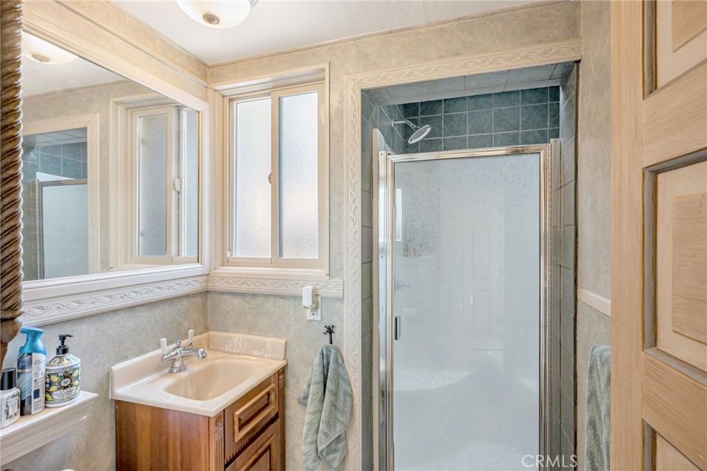 1126 Katherine Road Simi Valley, CA 93063 - Photo 31 of 66 a bathroom with a sink and a mirror