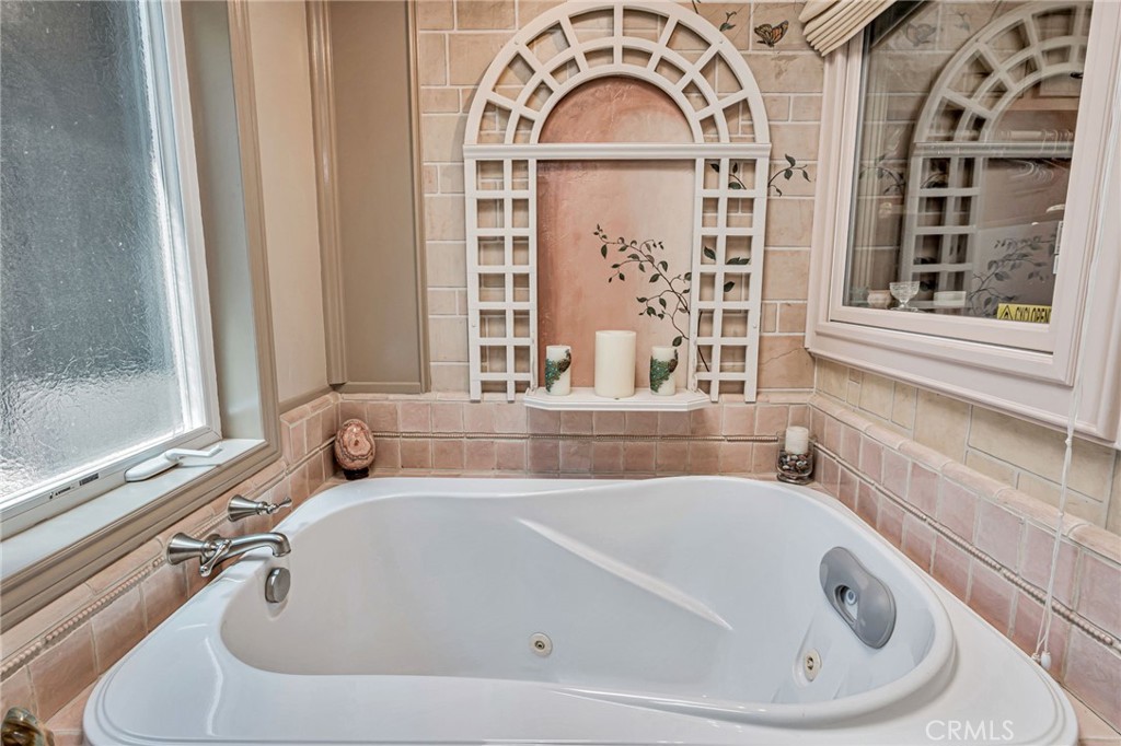1126 Katherine Road Simi Valley, CA 93063 - Photo 34 of 66 a bathroom with bathtub and window