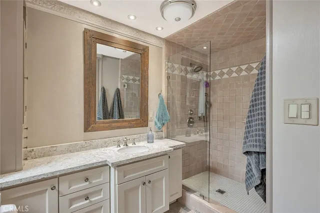 a view of a porch with a wooden fence